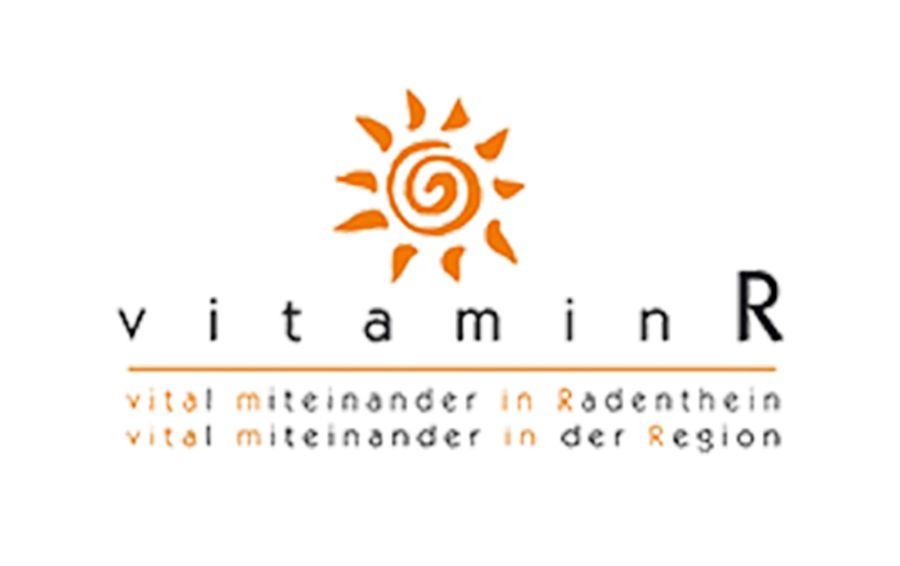 Das Logo von Vitamin R wird von einer orangen Sonne als Hauptmerk getragen. Über den Link erhalten Sie alle weiteren Informationen zu dieser Organisation.